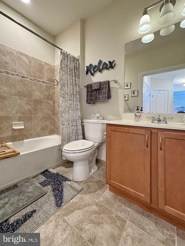 full bathroom featuring vanity, tile patterned floors, toilet, and shower / bath combo with shower curtain