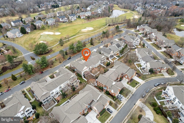 bird's eye view with a residential view, a water view, and view of golf course