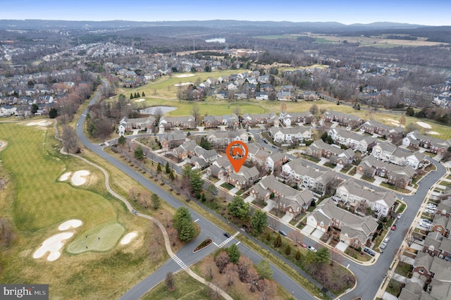 birds eye view of property featuring a residential view and view of golf course