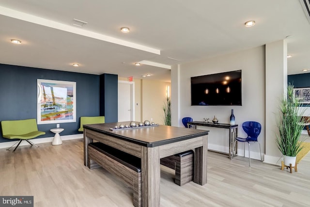 game room featuring baseboards, visible vents, and light wood-style floors