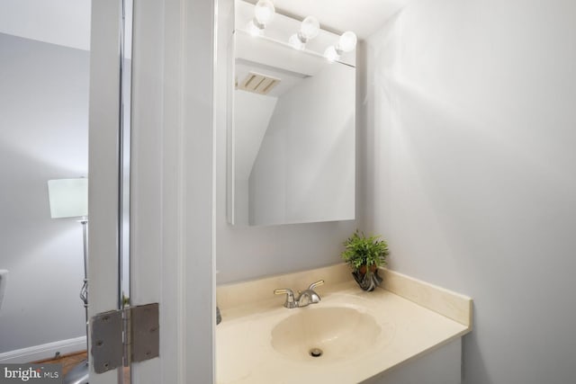 bathroom featuring visible vents and vanity