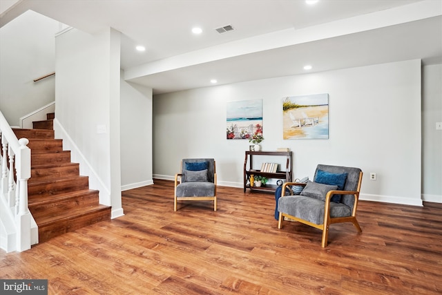 sitting room featuring wood-type flooring