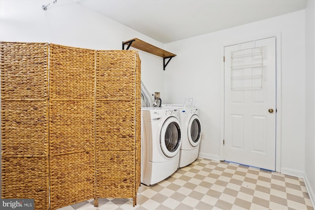 washroom featuring washing machine and dryer