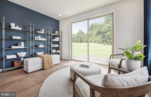 sitting room featuring hardwood / wood-style floors