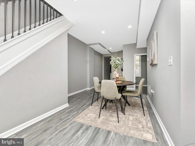 dining room with hardwood / wood-style flooring