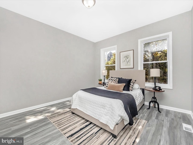 bedroom featuring hardwood / wood-style floors