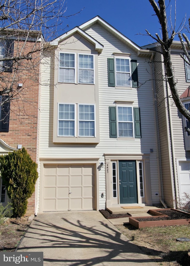 view of front of home featuring driveway and an attached garage