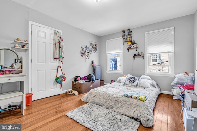 15 White St, Paterson, NJ 07522 - bedroom with hardwood / wood-style floors and radiator