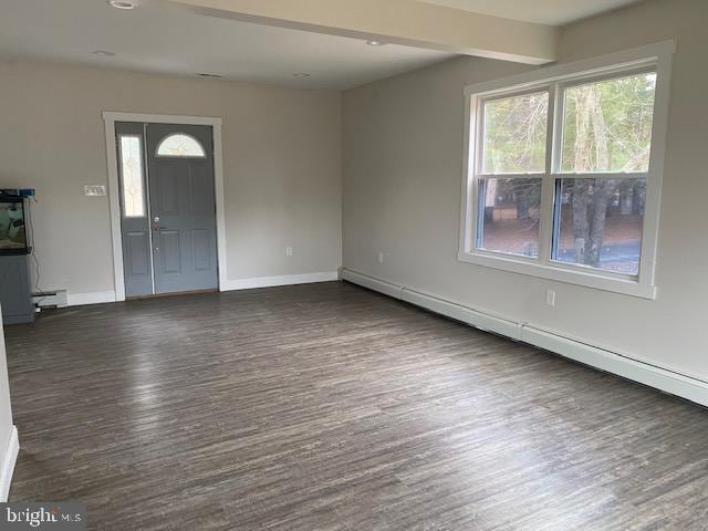 entryway with baseboards, a baseboard heating unit, dark wood-type flooring, and beamed ceiling