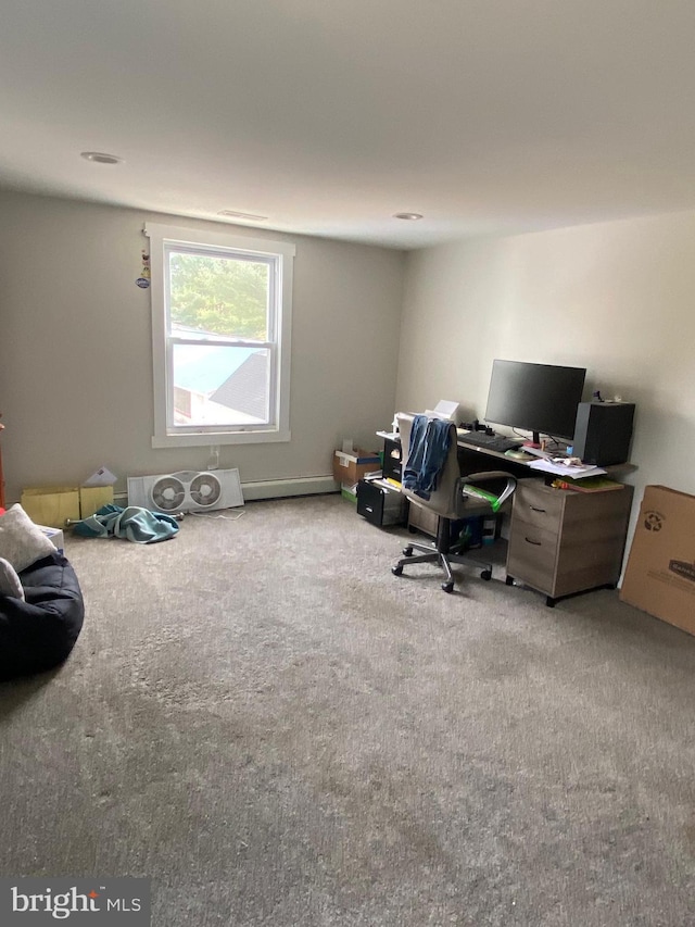 home office featuring light carpet and baseboard heating