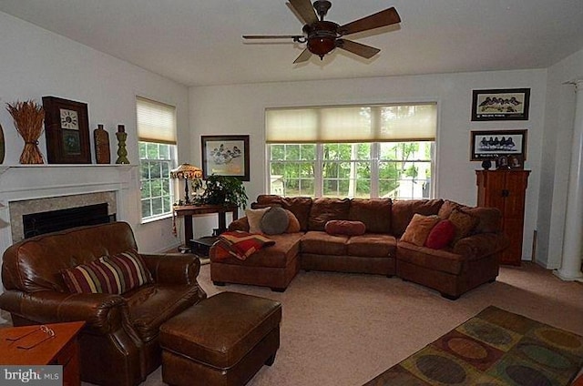 living room with carpet and ceiling fan