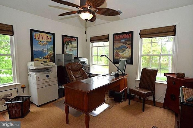 home office featuring ceiling fan and plenty of natural light