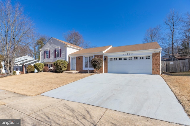 split level home featuring a garage