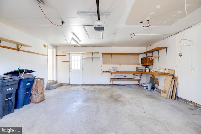 garage featuring a garage door opener