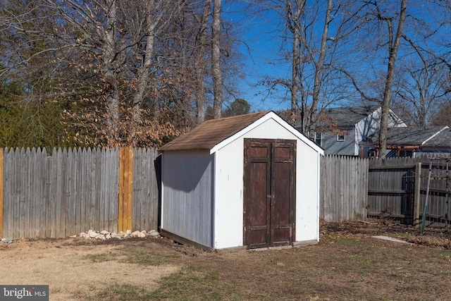 view of outbuilding featuring a lawn