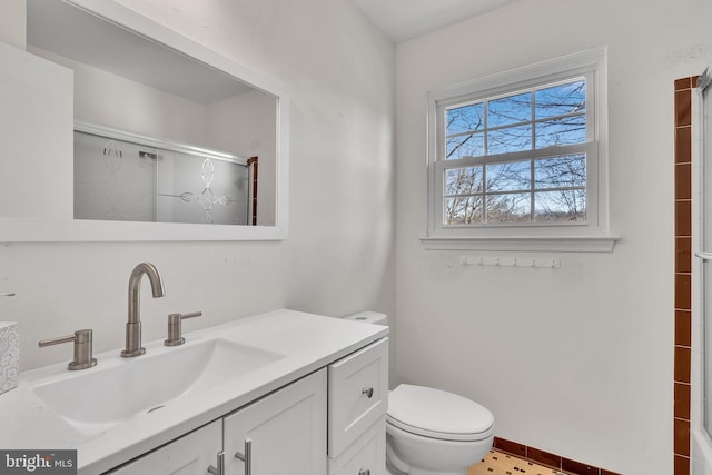 full bath featuring an enclosed shower, toilet, and vanity