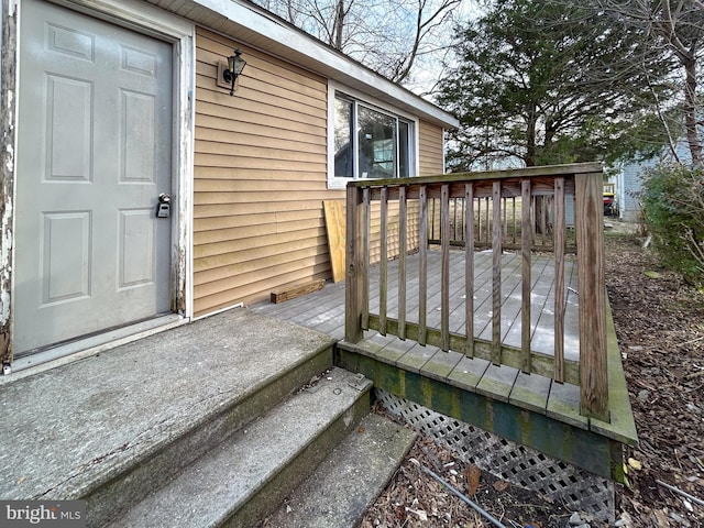 entrance to property featuring a deck