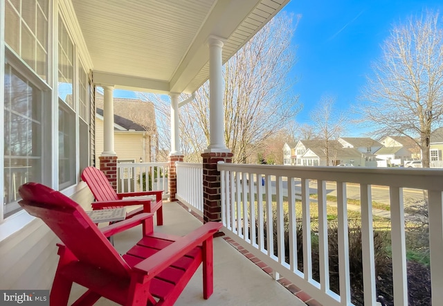 23534 Belmar Dr, Leonardtown, MD 20650 - balcony featuring covered porch and a residential view