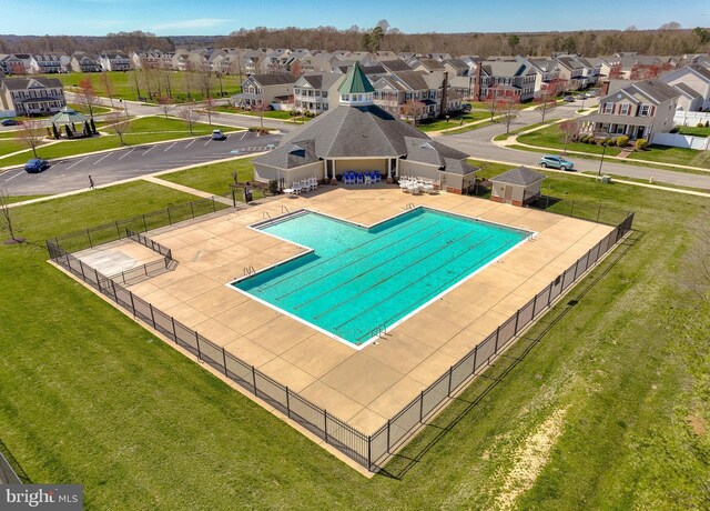 23534 Belmar Dr, Leonardtown, MD 20650 - pool featuring a patio, fence, a yard, and a residential view