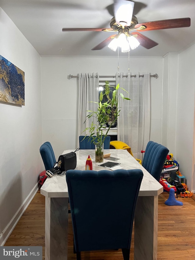 dining area featuring dark hardwood / wood-style flooring