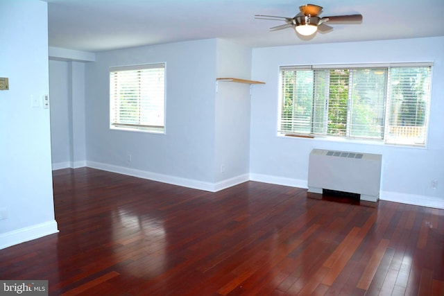 5340 Holmes Run Pkwy Unit 101, Alexandria, VA 22304 - unfurnished living room with radiator heating unit, a ceiling fan, hardwood / wood-style floors, and baseboards