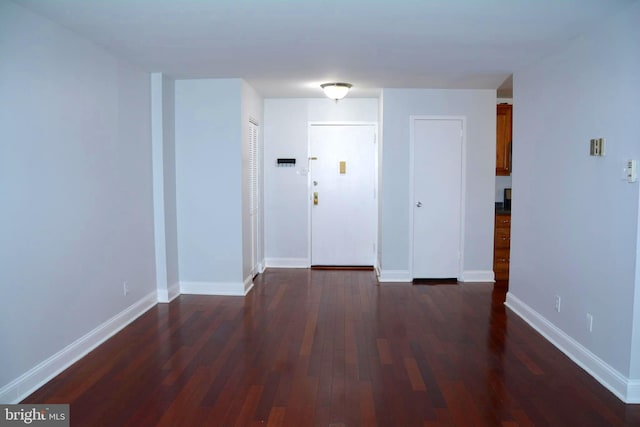 5340 Holmes Run Pkwy Unit 101, Alexandria, VA 22304 - spare room with dark wood-type flooring and baseboards