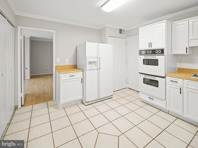 kitchen featuring white cabinets, white appliances, ornamental molding, and light countertops