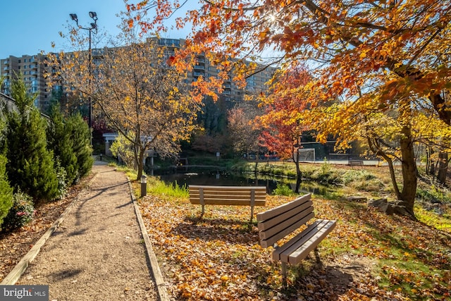 surrounding community featuring fence