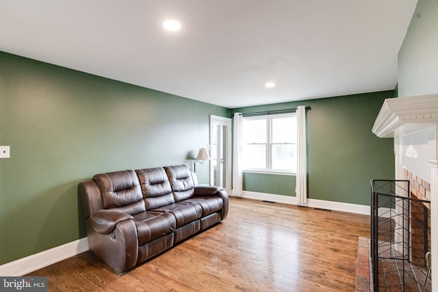 living room with hardwood / wood-style floors