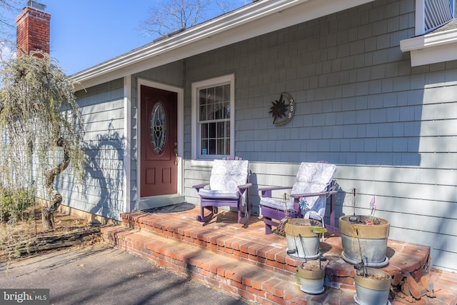 entrance to property with a porch