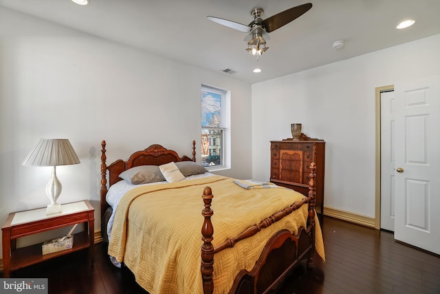 bedroom featuring dark wood-type flooring