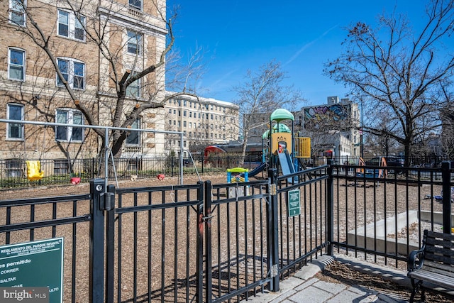 view of gate with fence