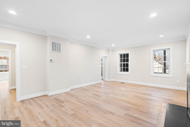 interior space featuring light wood finished floors, visible vents, and recessed lighting