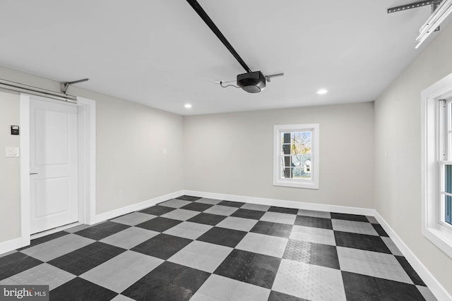 spare room with recessed lighting, baseboards, and dark floors