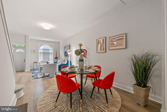 dining room featuring wood-type flooring