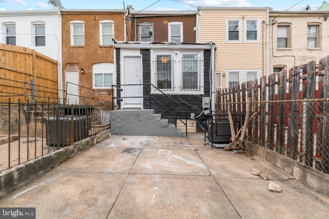 back of house with a patio