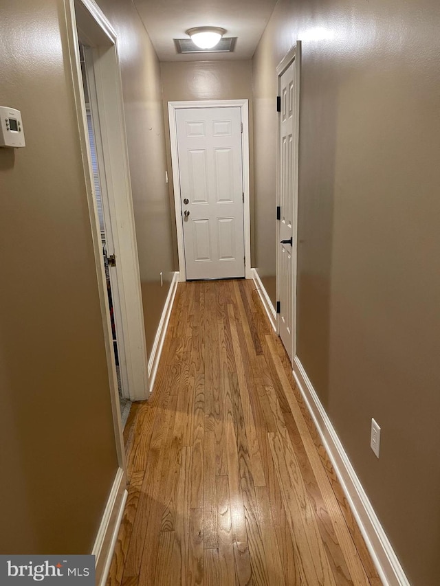 hall featuring light hardwood / wood-style flooring