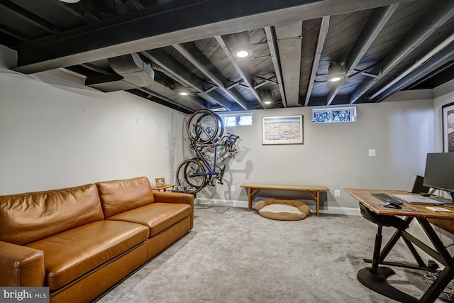 living area with carpet flooring and baseboards