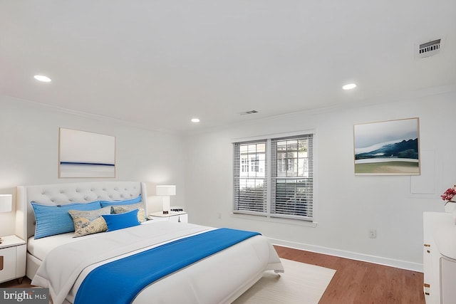 bedroom featuring hardwood / wood-style flooring