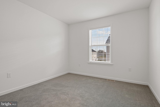 empty room with carpet floors