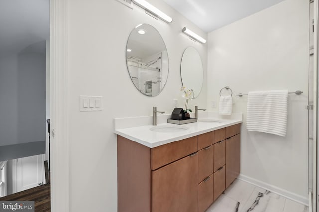 507 Janneys Ln, Alexandria, VA 22302 - full bath with double vanity, baseboards, a shower with door, and marble finish flooring