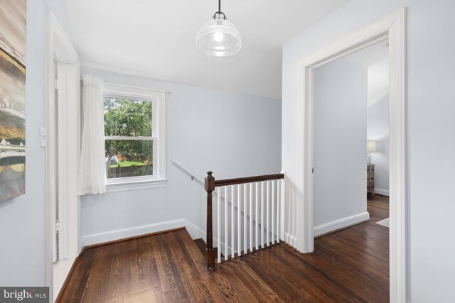 507 Janneys Ln, Alexandria, VA 22302 - hallway featuring an upstairs landing, wood finished floors, and baseboards