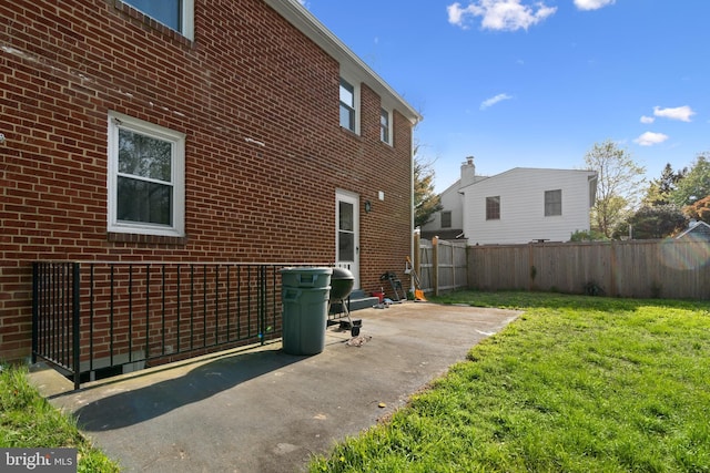 507 Janneys Ln, Alexandria, VA 22302 - view of side of property with a patio and brick siding