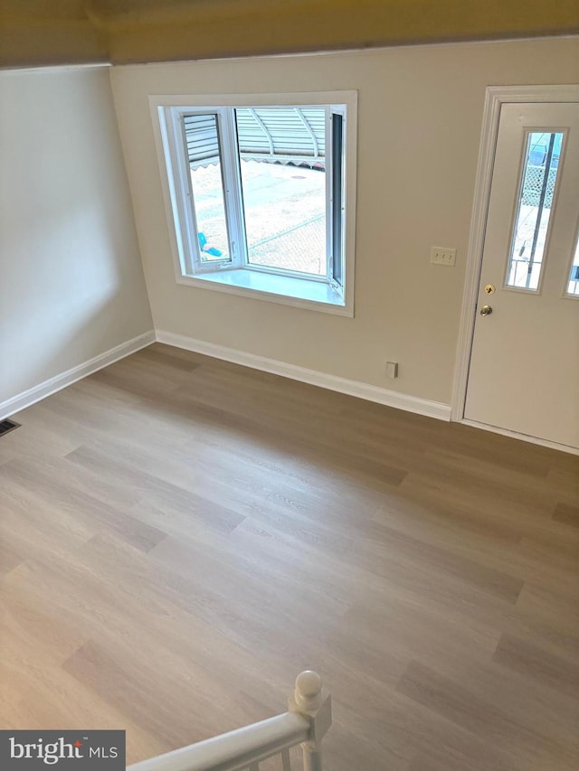 empty room featuring light hardwood / wood-style floors