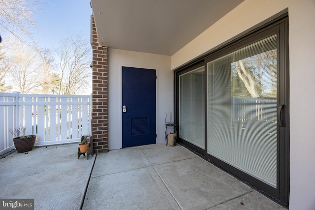 view of patio with a balcony