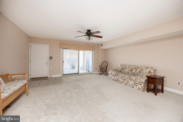 sitting room featuring carpet flooring and ceiling fan