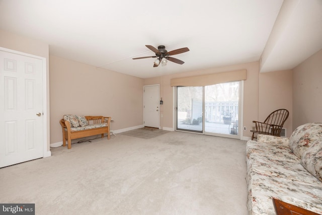 sitting room with light carpet and ceiling fan