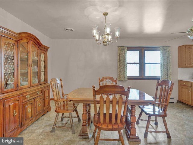 dining space with a chandelier and visible vents