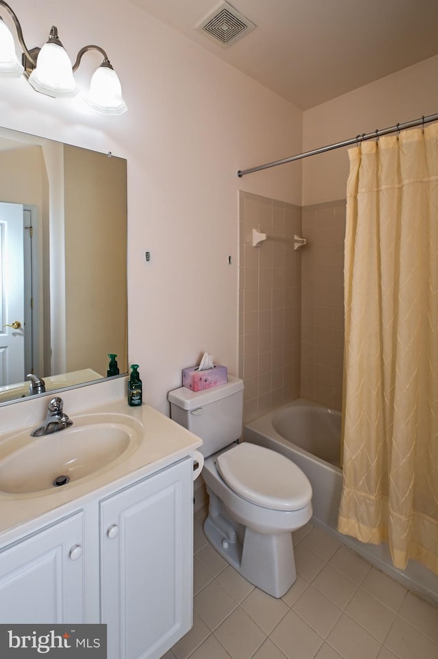 bathroom featuring visible vents, toilet, shower / tub combo with curtain, tile patterned flooring, and vanity