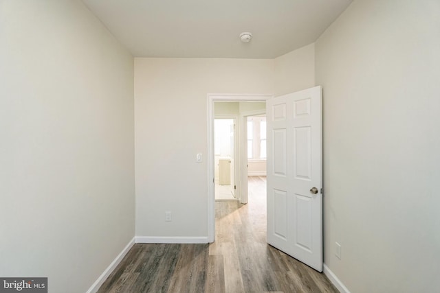 unfurnished room featuring hardwood / wood-style floors